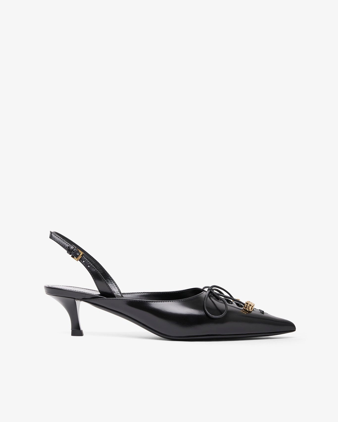Black slingback shoe with decorative bow on a white background