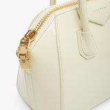 Antigona mini cream patent bag