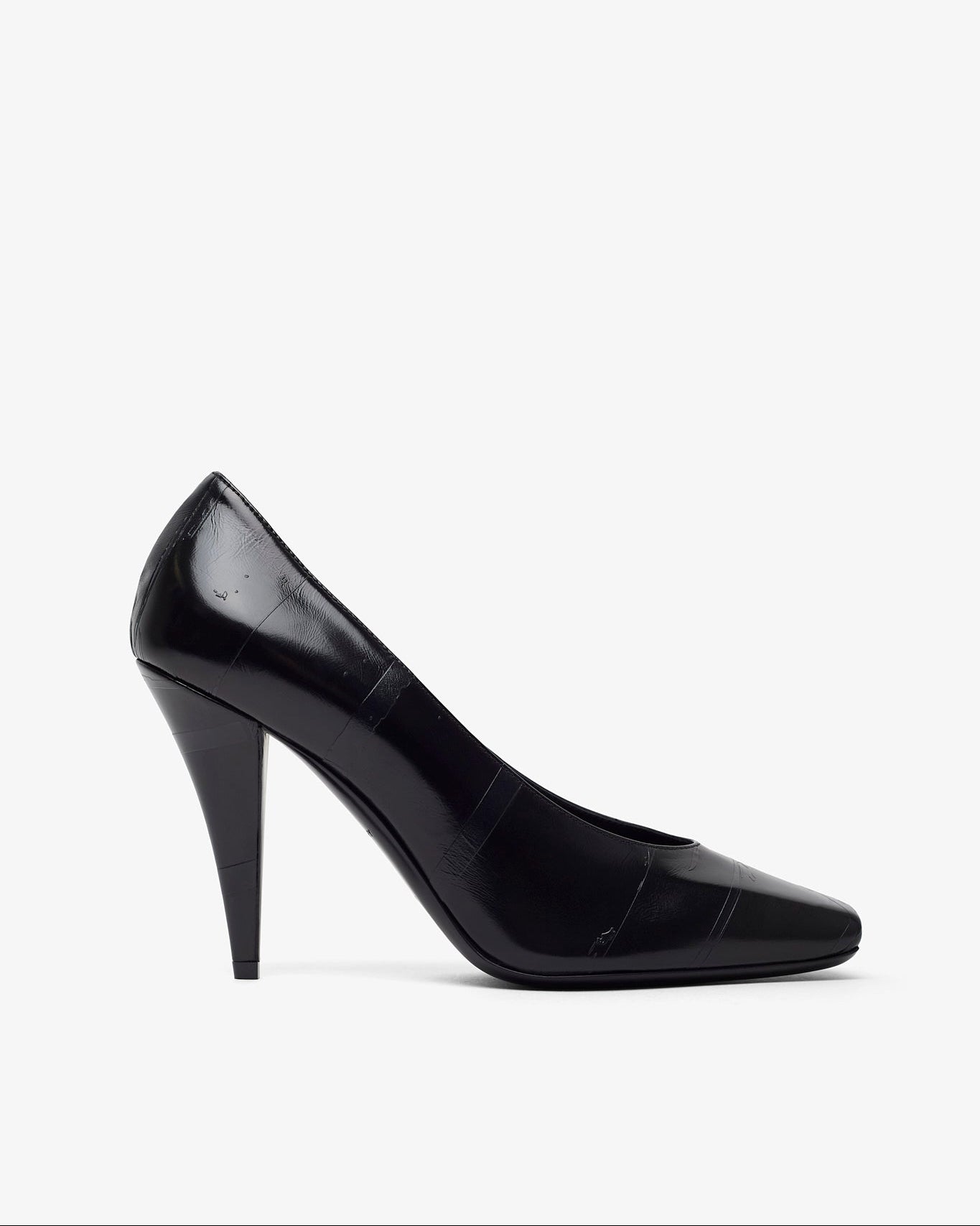 Black high-heeled shoe on a white background