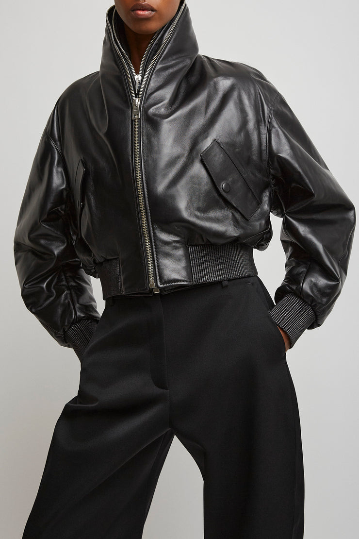 Zipped black leather bomber jacket