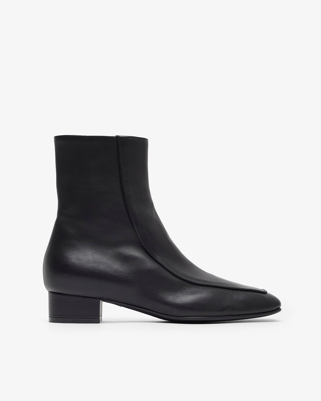 Black ankle boots on a white background