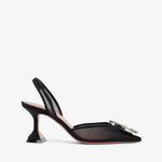 Black high-heeled shoe with a thin strap on a white background