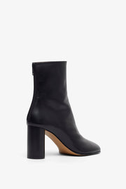Tug 80 black ankle boots