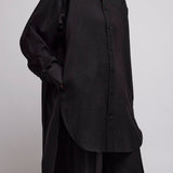 Elongated grey shirt