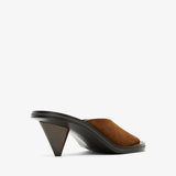 Brown sandal with a black heel on a white background