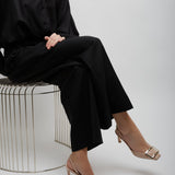 Trompette 70 beige patent slingback pumps