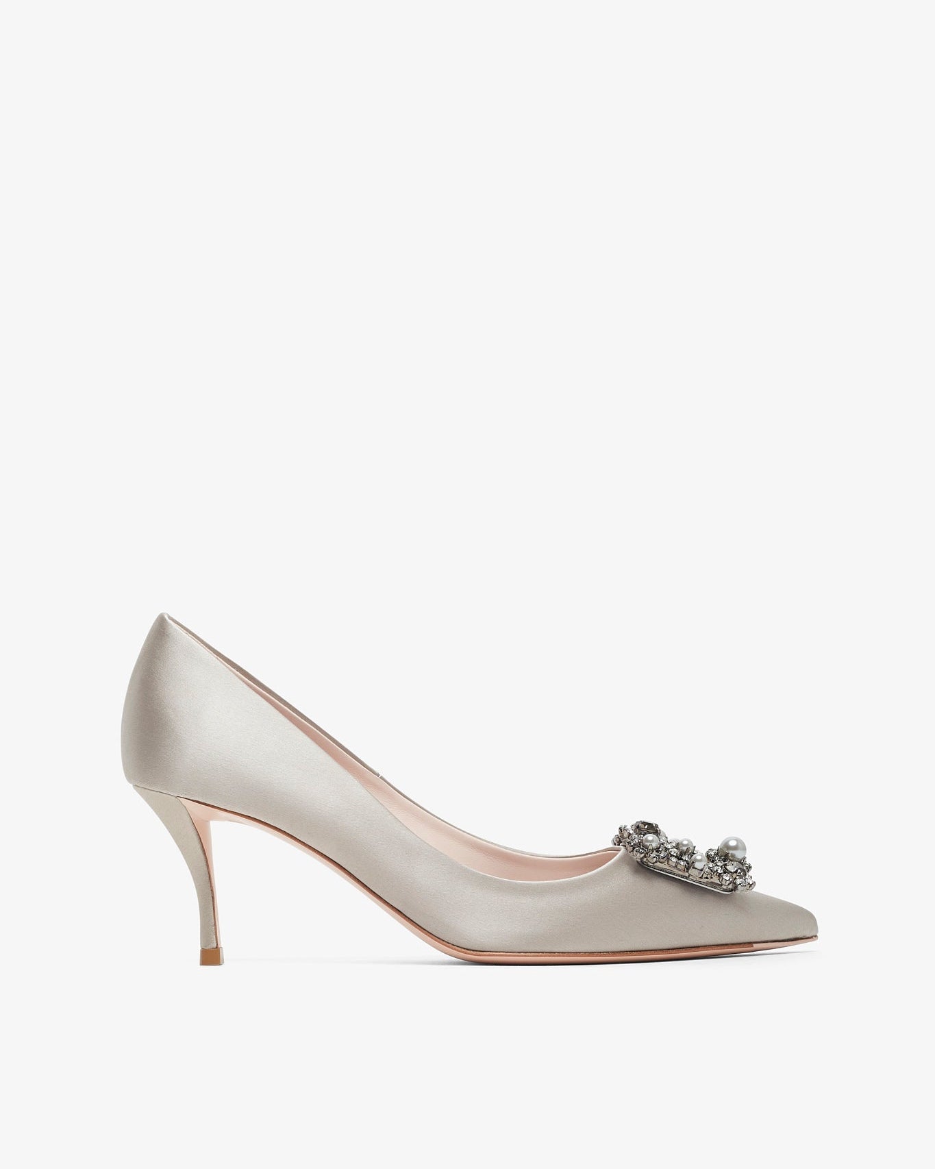 Silver high-heeled shoe with a decorative clasp on a white background
