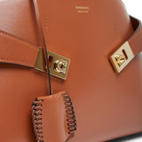 Hug small light brown bag