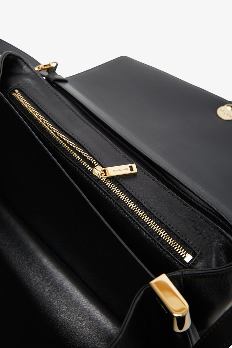 Front flap black crossbody bag