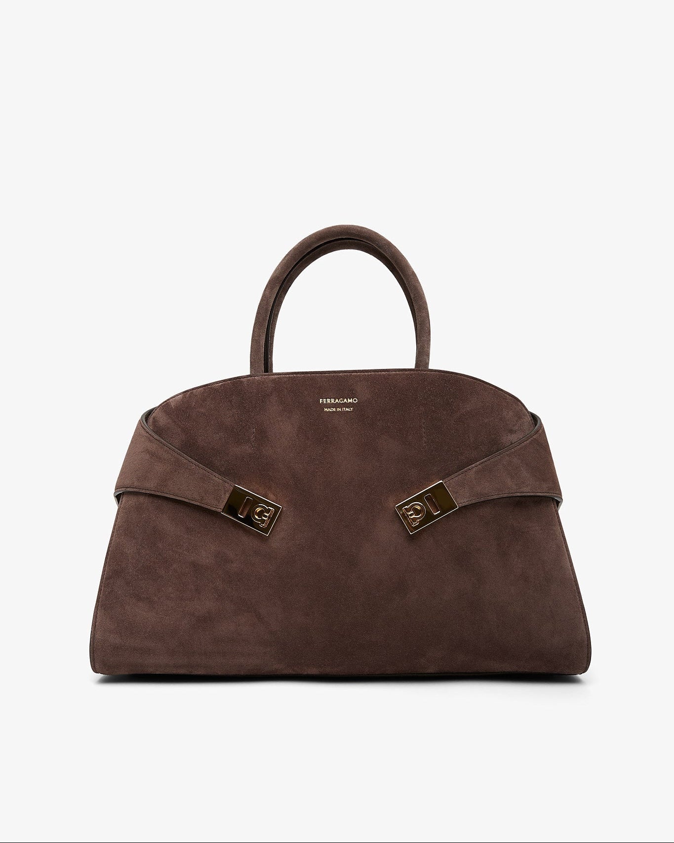 Brown handbag with gold accents on a white background