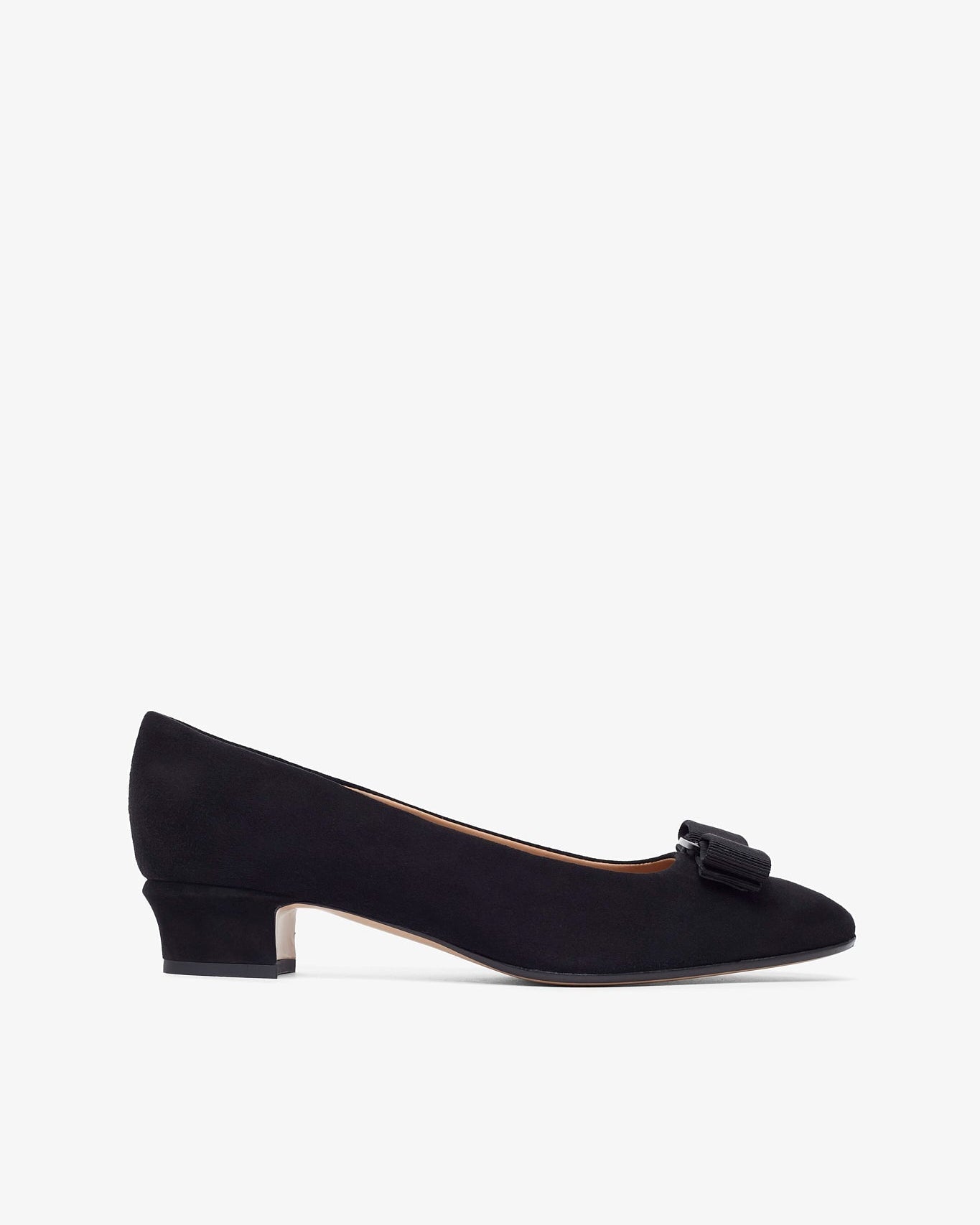 Black shoe with a bow on a white background