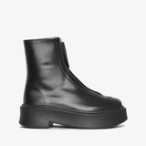 Black leather ankle boot on a white background