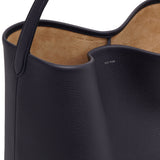 Large N/S dark blue leather tote bag