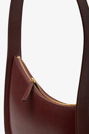 Half Moon burgundy leather bag