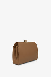 Amazon beige shiny leather clutch