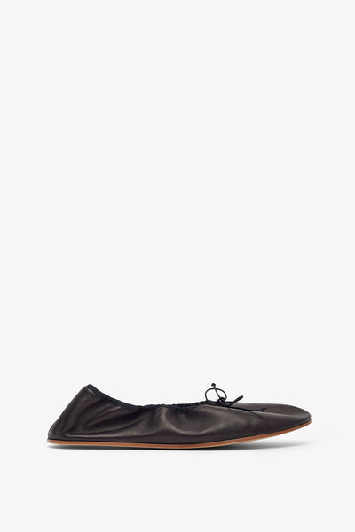 Round black ballet flats