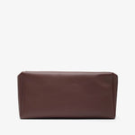 Brown leather clutch bag on a white background
