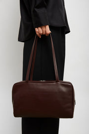 Astra burgundy leather bowling bag