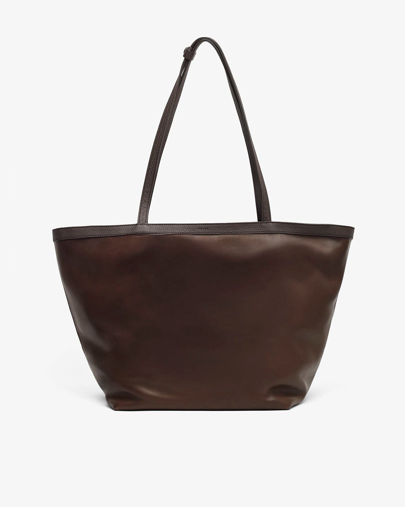 Brown leather tote bag on a white background