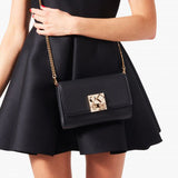 Carasky black leather clutch