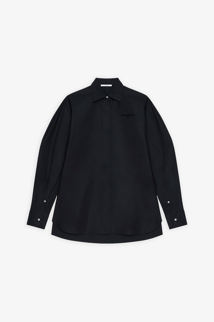 Cocoon black shirt with turned sleeves