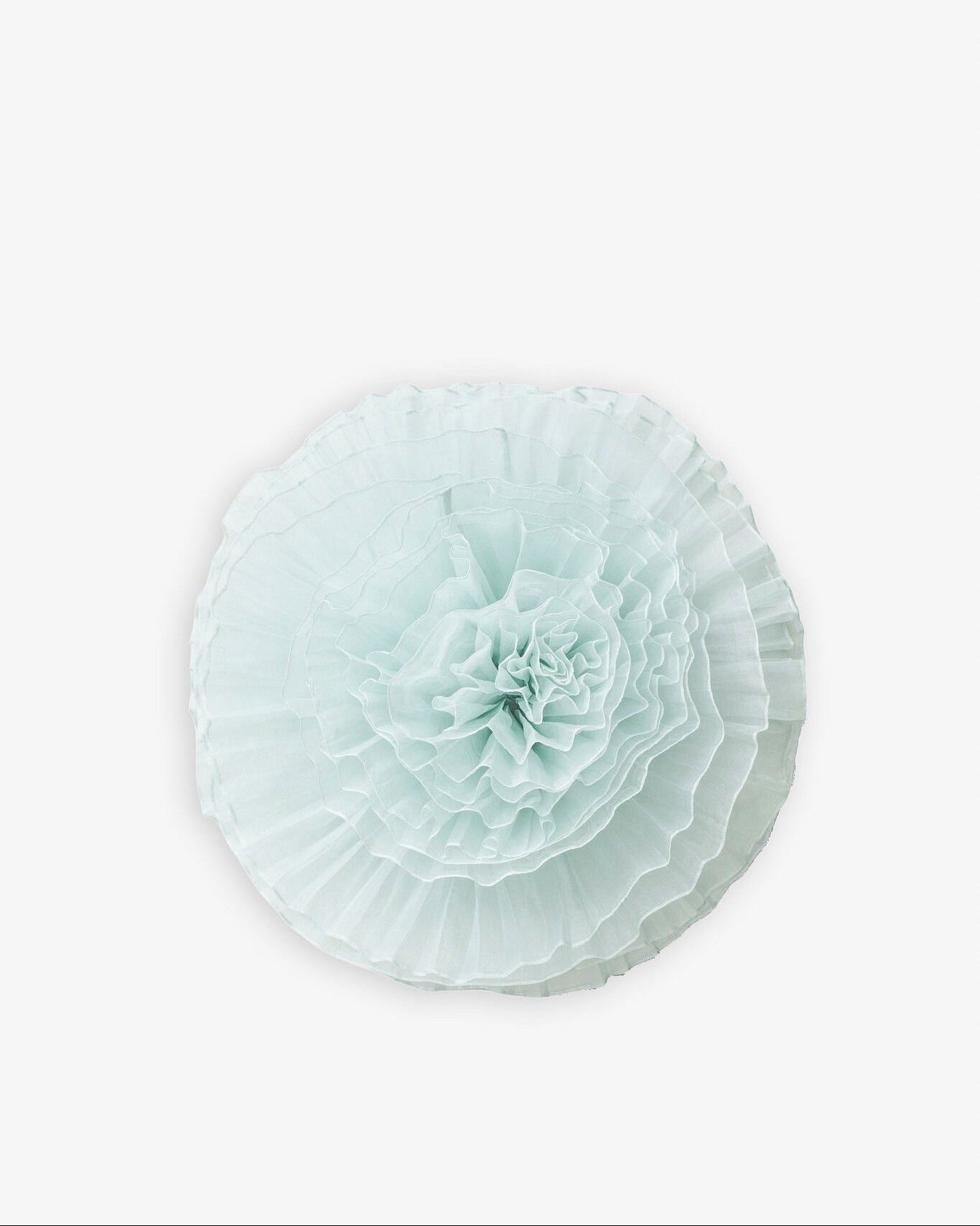 Light blue decorative item on a white background