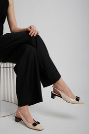 Iconic bow slingback pumps