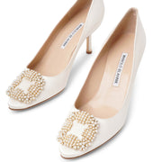 Hangisi 70 white satin pearl buckle pumps
