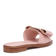 Isera pink leather studded bow slide sandals