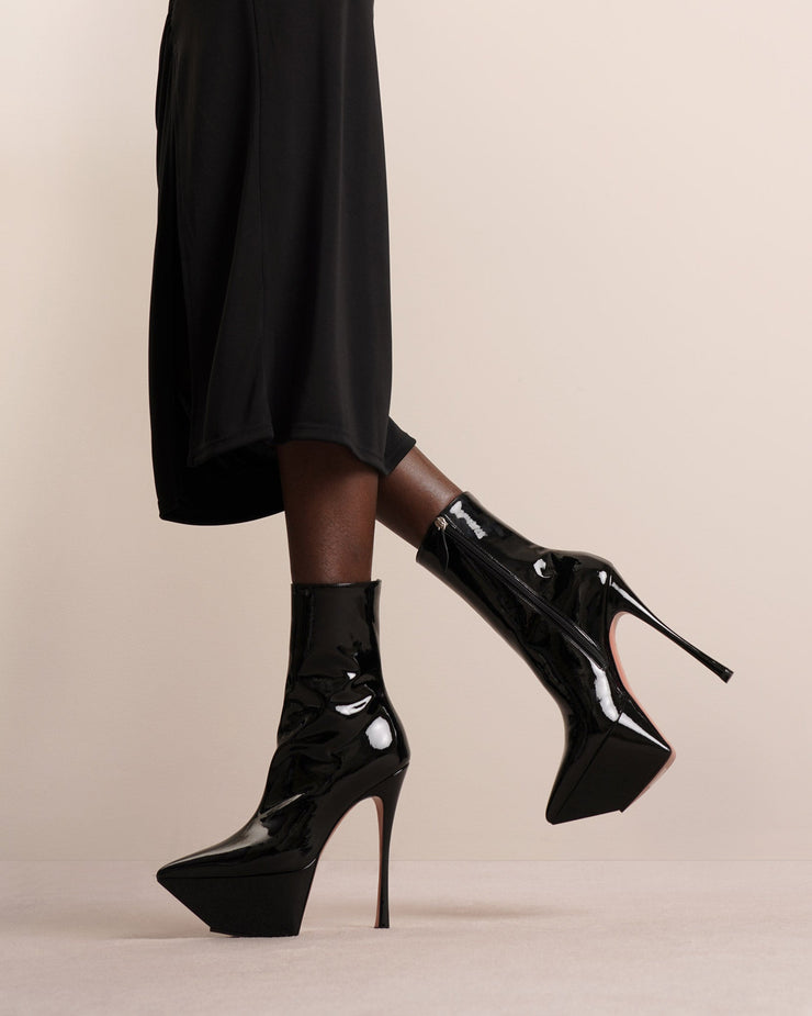 Yigit patent leather ankle boots